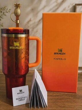 The Stanley 1913 x KAROL G 40 oz Quencher H2.O FlowState Tumbler Limited Edition
